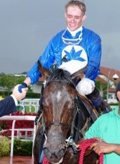 Zirna pictured after scoring in the 2003 Singapore Gold Cup.<br>Photo by Singapore Turf Club